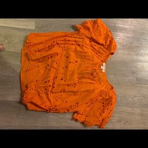Bright orange shirt
